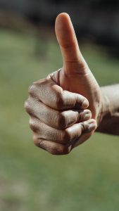 beginner-barbecuer-close- up-thumbs-up