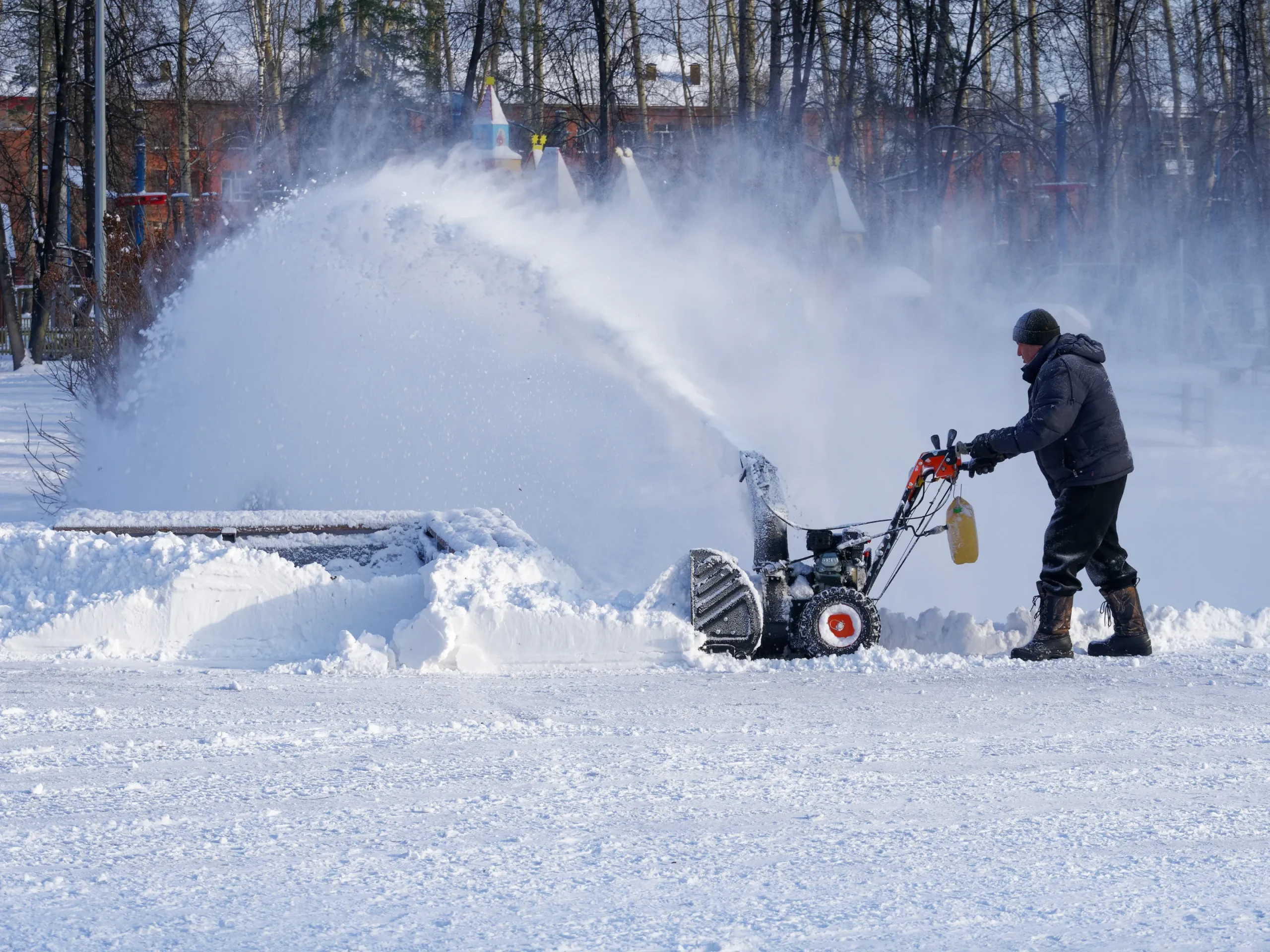 powerful snow blower plowing snow